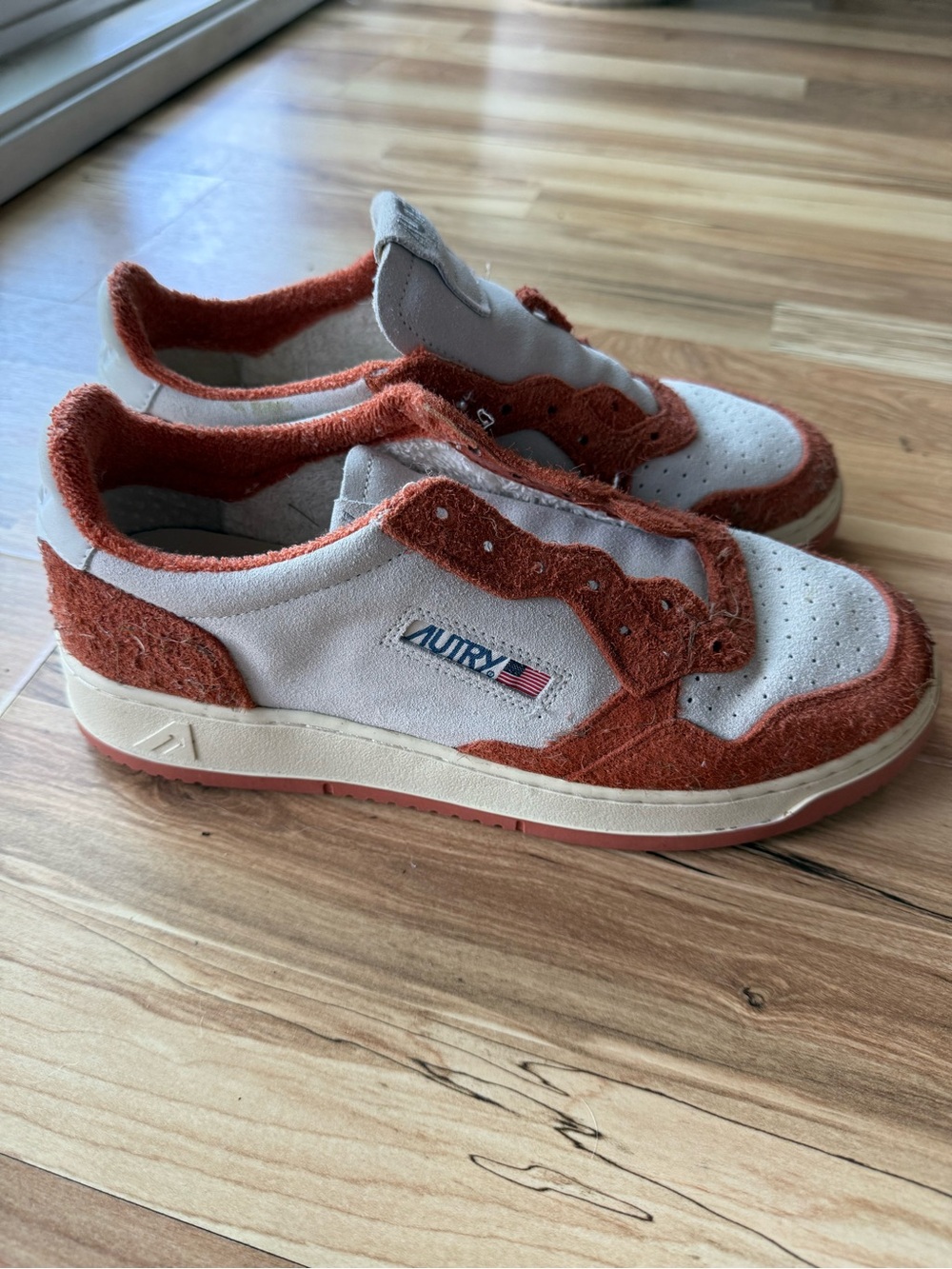 Autry Women's Low-Top Sneakers in off white and orange